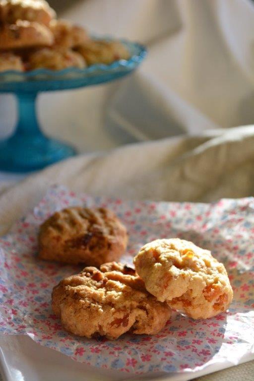 gluten-free apricot and coconut cookies on plate with patterned paper