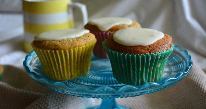 Blue cake stand with gluten-free lemon poppyseed cupcakes