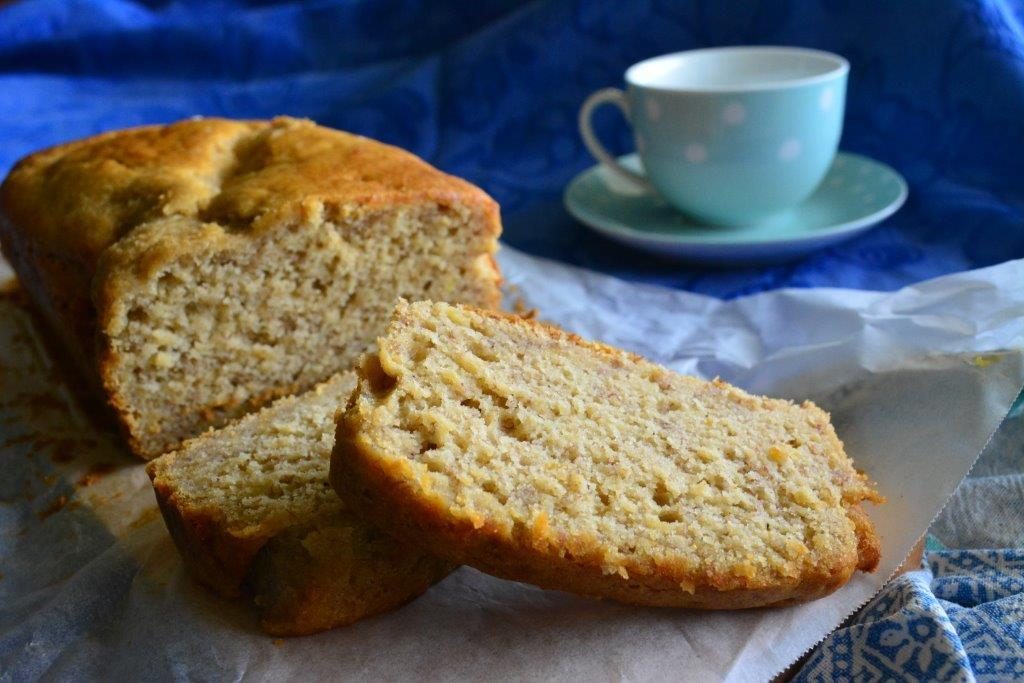 Gluten-free banana bread with a light blue spotted tea cup and saucer